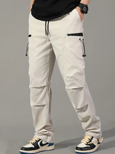 Cargar imagen en el visor de la galería, Pantalones: Estilo cargo. Moda coreana. Con múltiples bolsillos. Sueltos, rectos y con cordón ajustable. Varios colores sólidos.