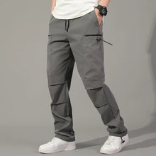 Cargar imagen en el visor de la galería, Pantalones: Estilo cargo. Moda coreana. Con múltiples bolsillos. Sueltos, rectos y con cordón ajustable. Varios colores sólidos.