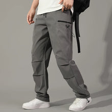 Cargar imagen en el visor de la galería, Pantalones: Estilo cargo. Moda coreana. Con múltiples bolsillos. Sueltos, rectos y con cordón ajustable. Varios colores sólidos.
